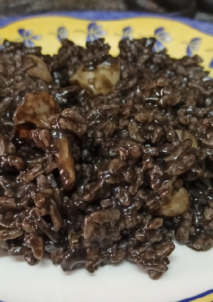 Una foto de Arroz negro con sepia