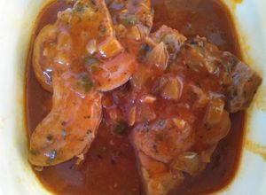 Una foto de Chuletillas de pavo en salsa de tomate