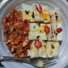A picture of Yam and egg sauce.
