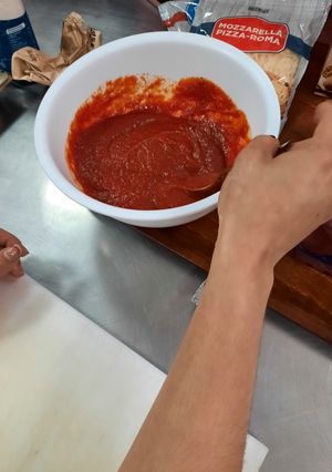 Una foto de Salsa de tomate para base de pizza