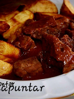 Una foto de Guiso de carne al toro