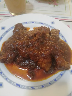 Una foto de Costillas con tomate