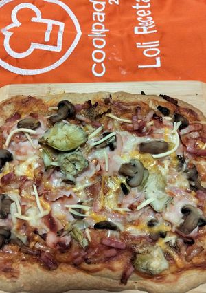 Una foto de Pizza de Masa Casera Familiar