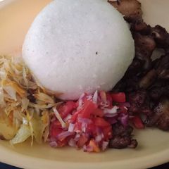 A picture of Fried Pork Kachumbari n Ugali.