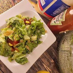 A picture of Fattoush salad in mayonnaise dressing.