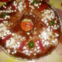 Una foto de Roscón de reyes todo de chocolate