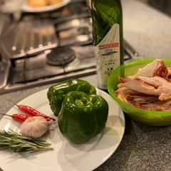 A picture of Chicken with garlic and rosemary.