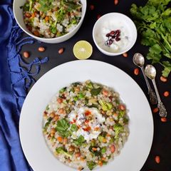 A picture of Sabudana Vegetable Khichdi With Cucumber Pomegranate Raita.