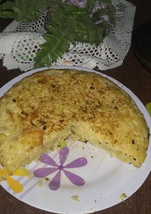 Una foto de Tortilla de papa y arroz
