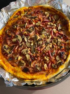 Una foto de Pizza dominós con MCC