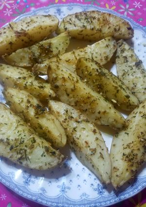 Una foto de Papas rústicas
