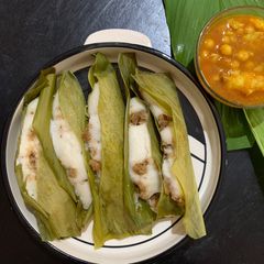 A picture of Enduri Pitha - An Oriya Delicacy (Turmeric leaf infused dish).