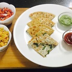 A picture of Cheese paneer stuffed paratha.