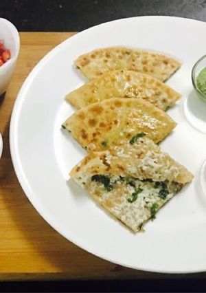 A picture of Cheese paneer stuffed paratha.