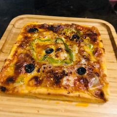 A picture of Roasted meaty pizza.