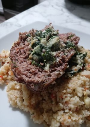 A picture of Spinach Artichoke dip Stuffed Meatloaf.