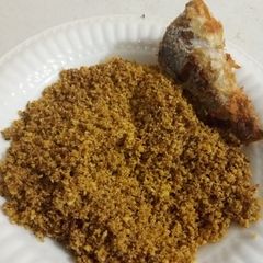 A picture of Fried Sugar Cassava flakes with grilled fish.