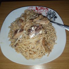 A picture of Spaghetti and sardine.