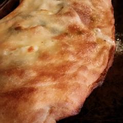 Brad's Margherita style calzone with chicken, artichoke, & ranch A picture of Brad's Margherita style calzone with chicken, artichoke, & ranch.