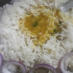 A picture of Arhar ki Dal with rice.