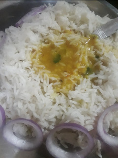 A picture of Arhar ki Dal with rice.