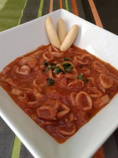 Una foto de Calamares en salsa Americana