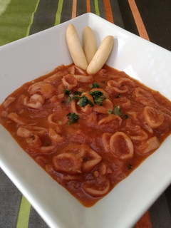 Una foto de Calamares en salsa Americana