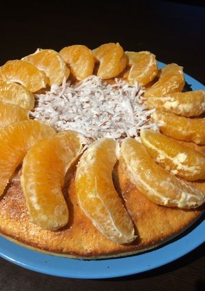 Una foto de Queque de naranja con nueces y coco natural