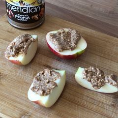 A picture of Peanut butter on apple.