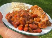 A picture of baked beans and ground meat
