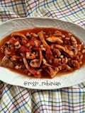 Totani in umido con fagioli occhio nero