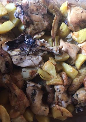 Une photo de Poulet pomme de terre au four