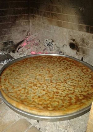 Φωτογραφία της συνταγής Λαχανόπιτα γυριστή στο τζάκι