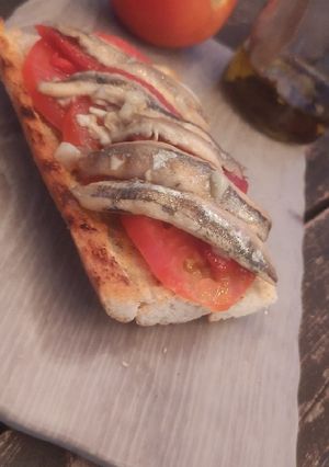 A picture of Anchovy, Tomato, and Roasted Pepper Toast.