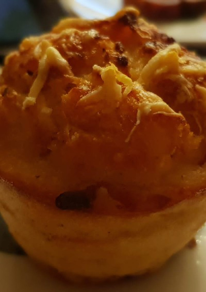 Una foto de Muffins salados de jamón, queso y bacon