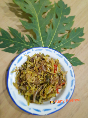 Bagaimana Membuat Tumis bunga pepaya ikan teri yang Lezat