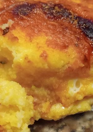 Una foto de Polenta rellena de jamón y queso