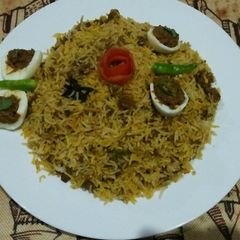 A picture of Eggs qeema biryani.