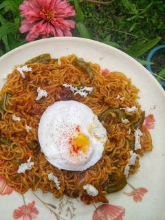 A picture of Vegetable Maggi with Poached Egg.