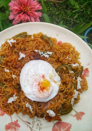 A picture of Vegetable Maggi with Poached Egg.