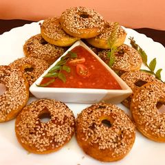 A picture of Instant Doughnut Shaped Handvo (savory Doughnut cake) made of maize flour#bakedsnacks.