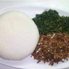 Ugali, sukuma wiki & wet-fried omena A picture of Ugali, sukuma wiki & wet-fried omena.