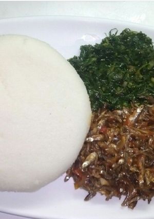 A picture of Ugali, sukuma wiki & wet-fried omena.