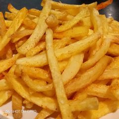 A picture of French Fries resturant style.