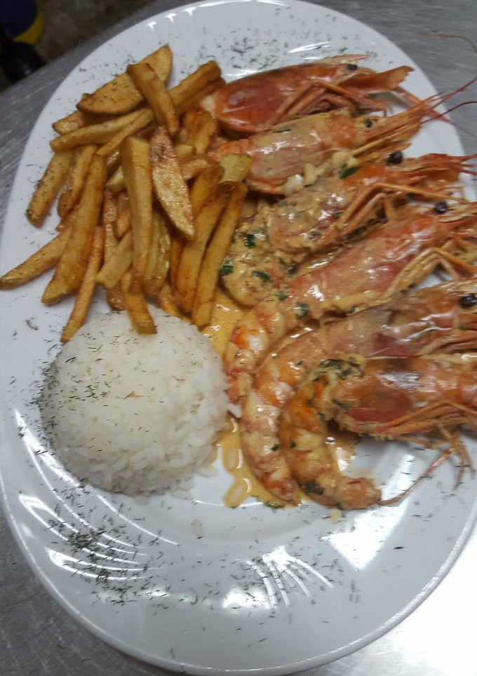 Una foto de Langostinos al whisky 
