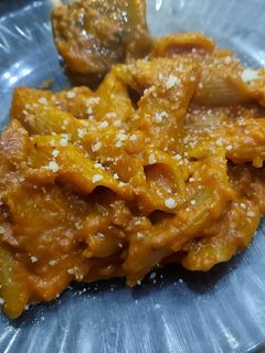 Una foto de Salsa de tomate y crema con pasta