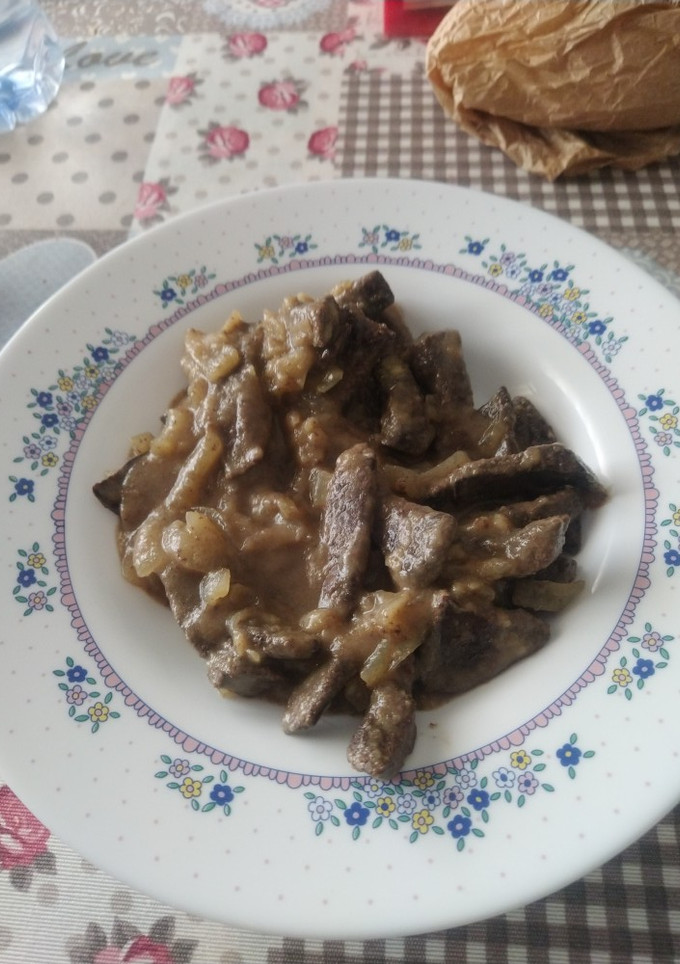 Una foto de Hígado de cerdo encebollado
