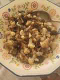Coliflor con salteado de morcilla y cebolla confitada