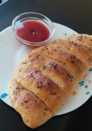 A picture of Domino's style stuffed cheese garlic bread.