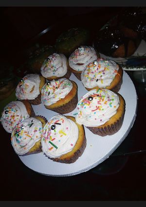 A picture of Vanilla cupcake with whipping cream frosting*.